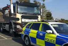 Driver caught on mobile behind the wheel of a lorry